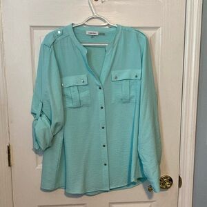 Calvin Klein dress top. Size XL. Sleeves can be worn down or half up as shown.